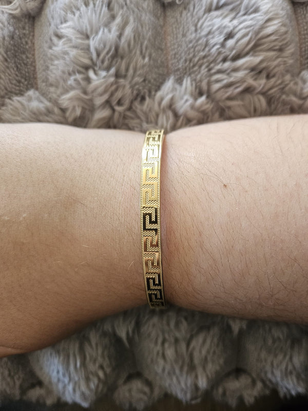 Bracelet doré à motifs