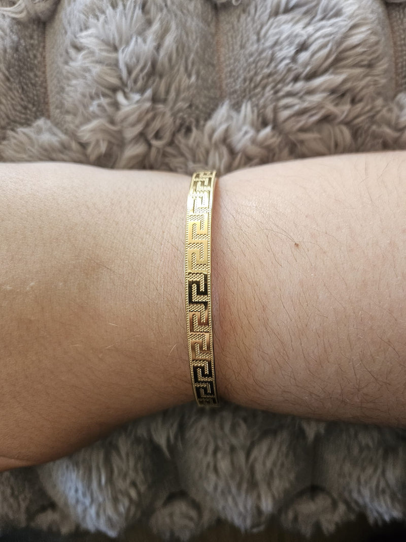 Bracelet doré à motifs